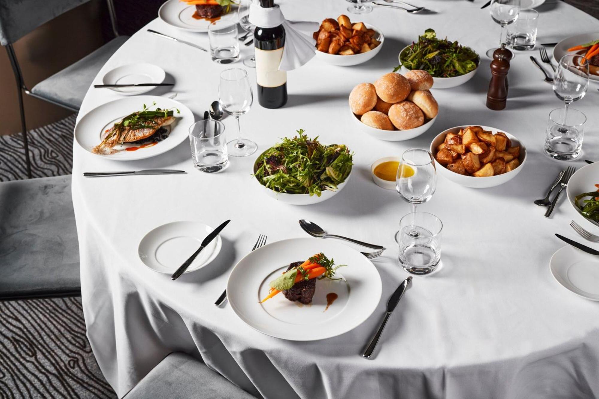Melbourne Marriott Hotel Docklands Εξωτερικό φωτογραφία A table set for a formal dinner